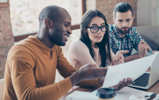 students studying for an Online MBA