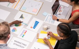 Marketing employees deciding the new strategy and predicting