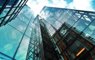 A photo of a modern office building of a company committed to ethical business practices.